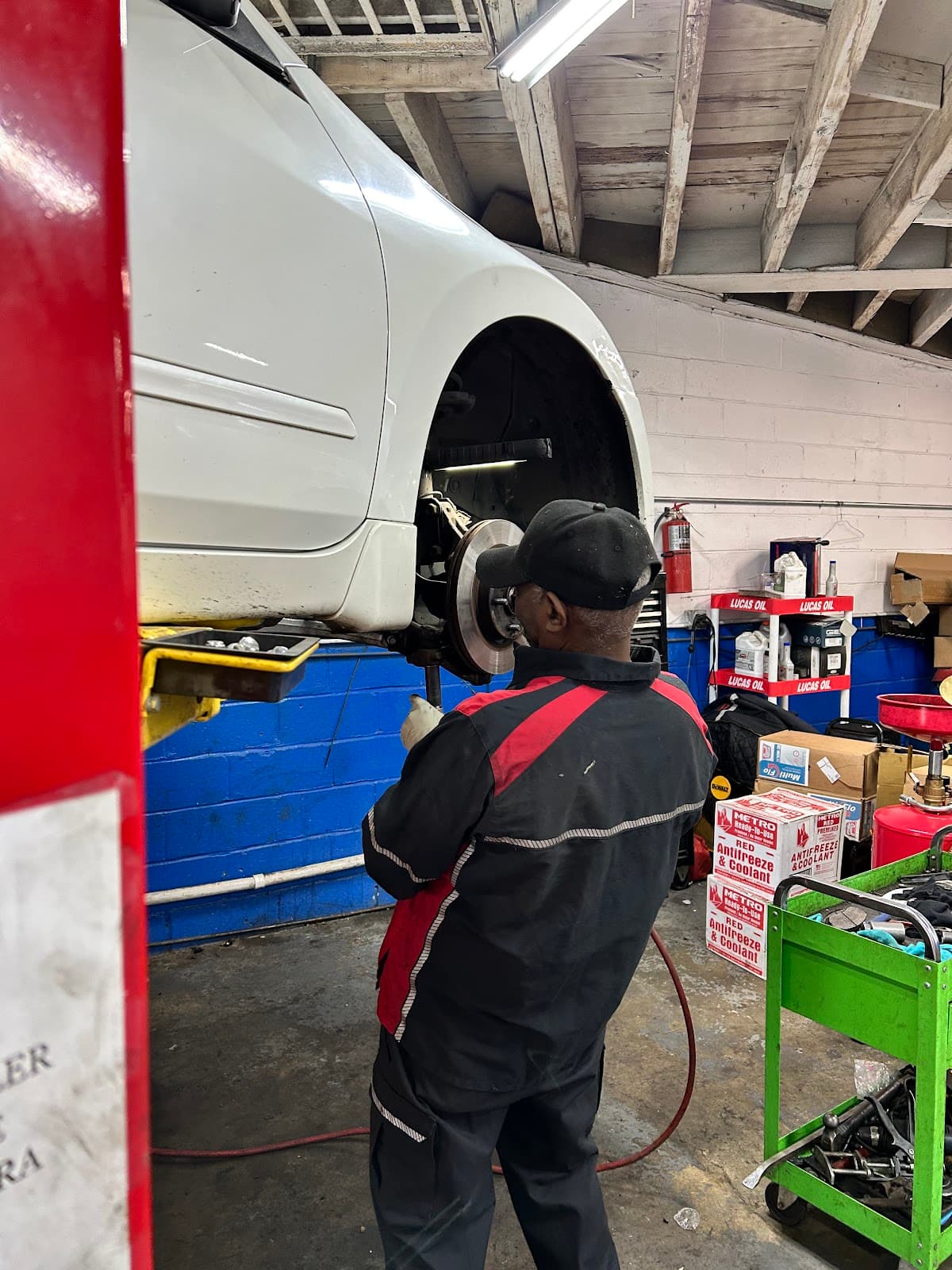 Mechanic working on a wheel hub